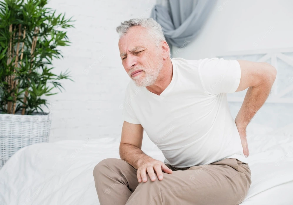 Chiropractor Springfield Illinois elder man with back pain